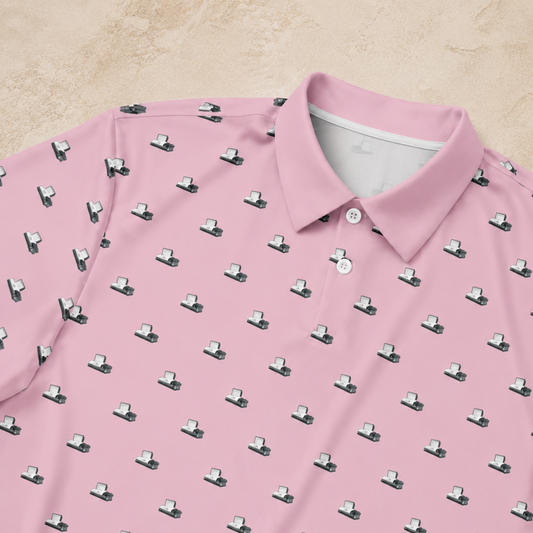 Pink polo shirt with small pattern on a beige background