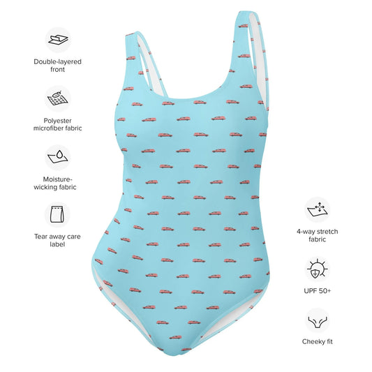 Pink Hearse on Light Blue - One Piece Swimsuit - death positive, embalmer, funeral coach, funeral director, funerals, goth, hearse, mortician one piece swimsuit