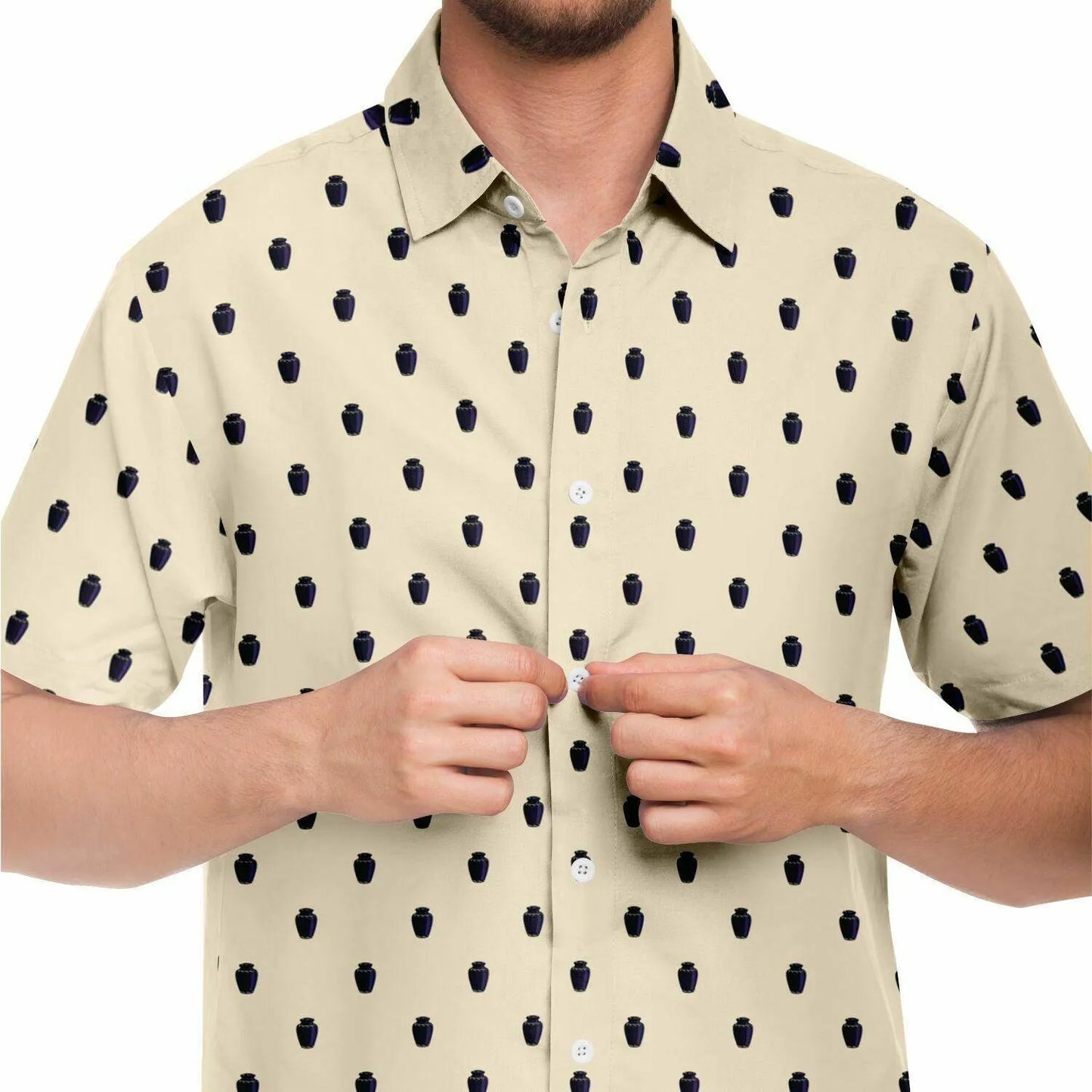 Male model wearing a papaya whip color button down tee featuring a pattern containing dark purple cremation vase urns. Front view close up.