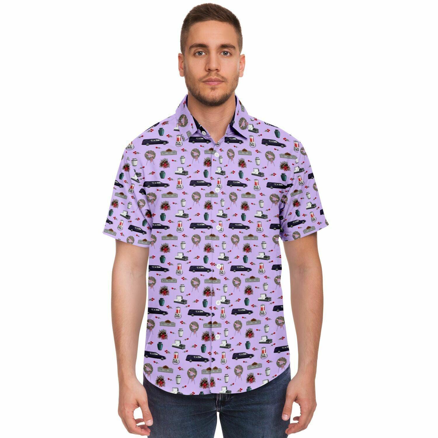 Front view man wearing light violet button down shirt with funeral pattern on it containing cremation urn, hearse, casket, coffin, embalming machine, funeral flowers, red roses, 