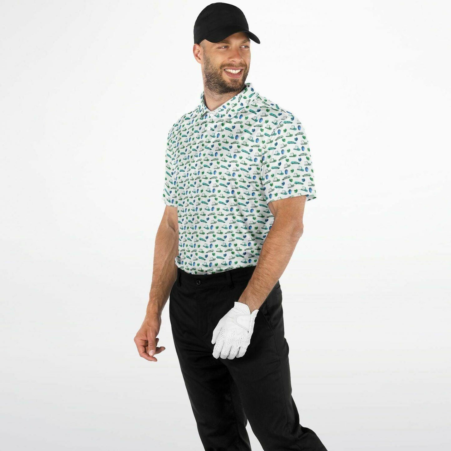 front side angle view of male model wearing white golf polo golf shirt with green caskets, coffins, cremation urns, skull in shades of green pattern and shirt tucked in