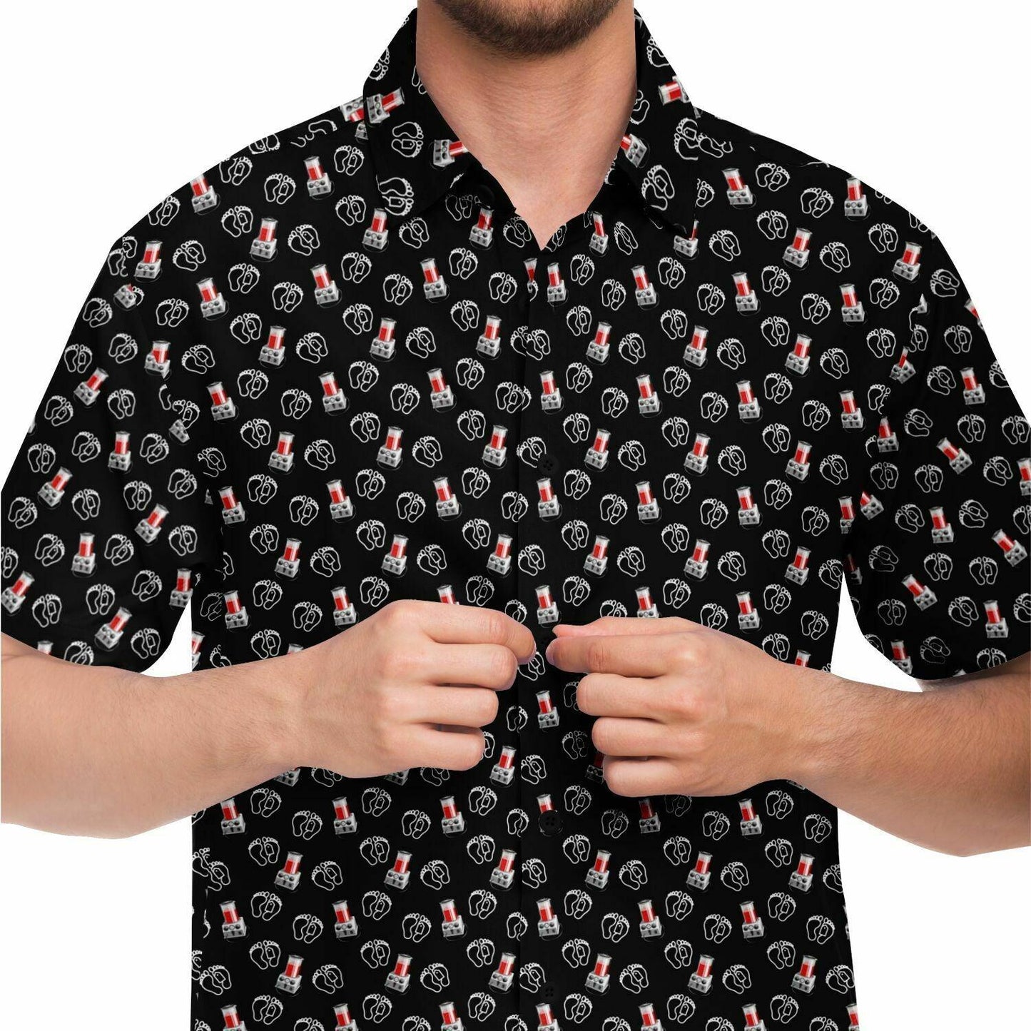 close up view of black button up short sleeve shirt featuring embalming machines porti-boy pattern on it