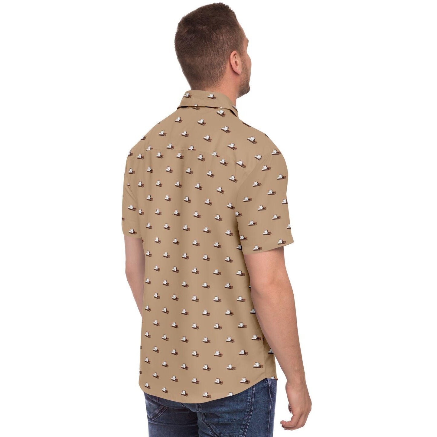 Back angle view of man wearing a button up shirt with short sleeves. The button down tee is light brown with little brown caskets on it.