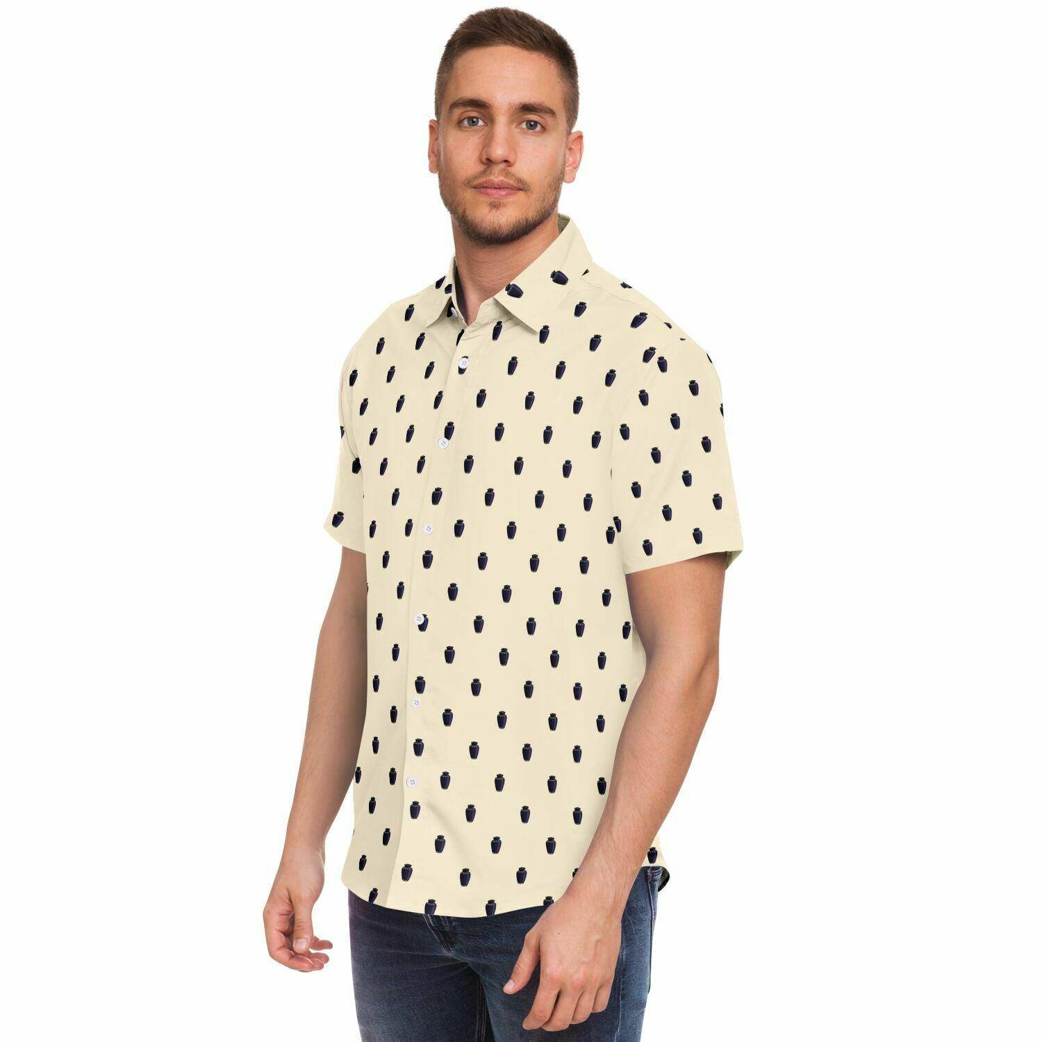 Man wearing dark purple cremation vase style urn pattern on a papaya whip color button down short sleeve shirt. frontal side view