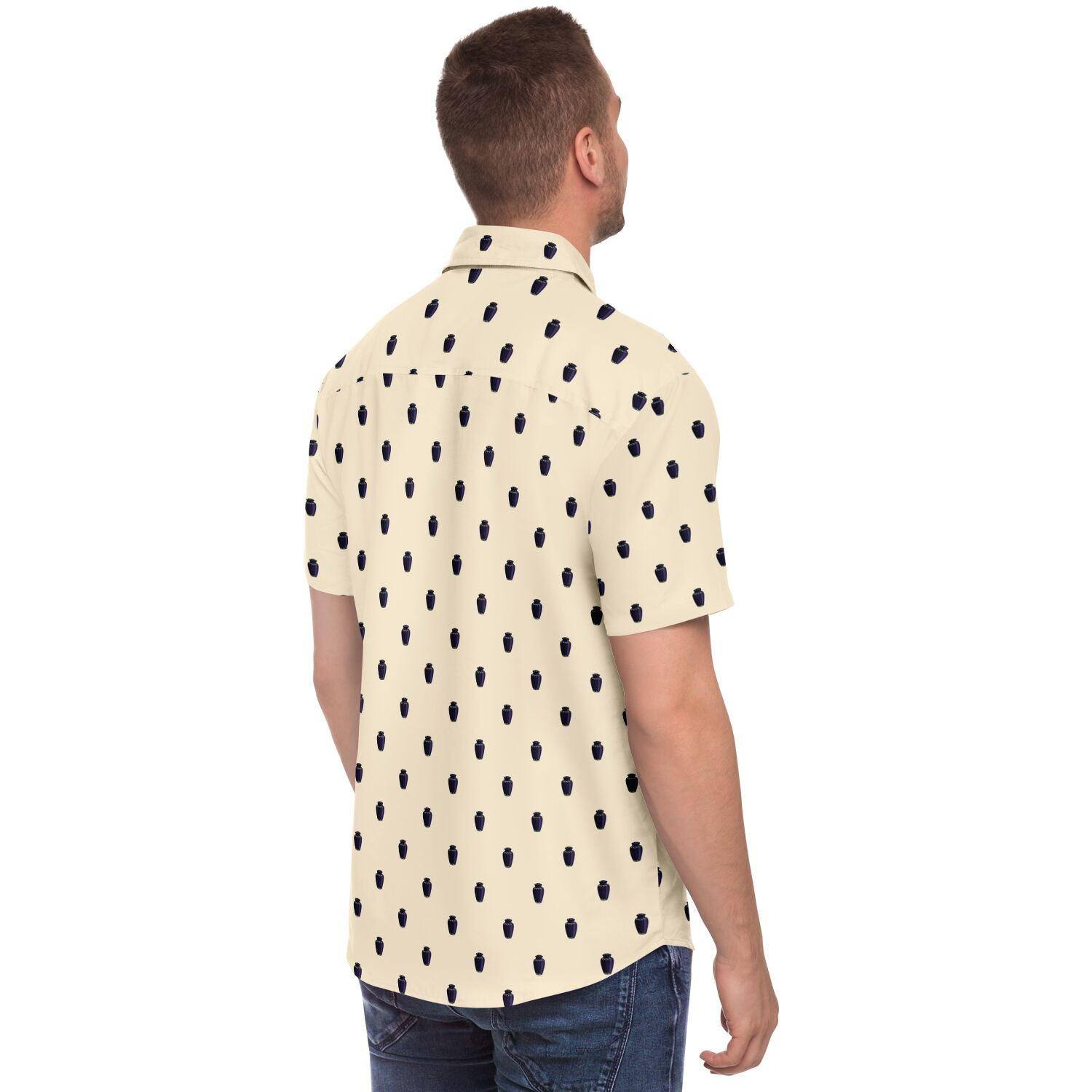 Man wearing Dark purple brass urn pattern on a papaya whip color button up short sleeve shirt. Back side angle view.