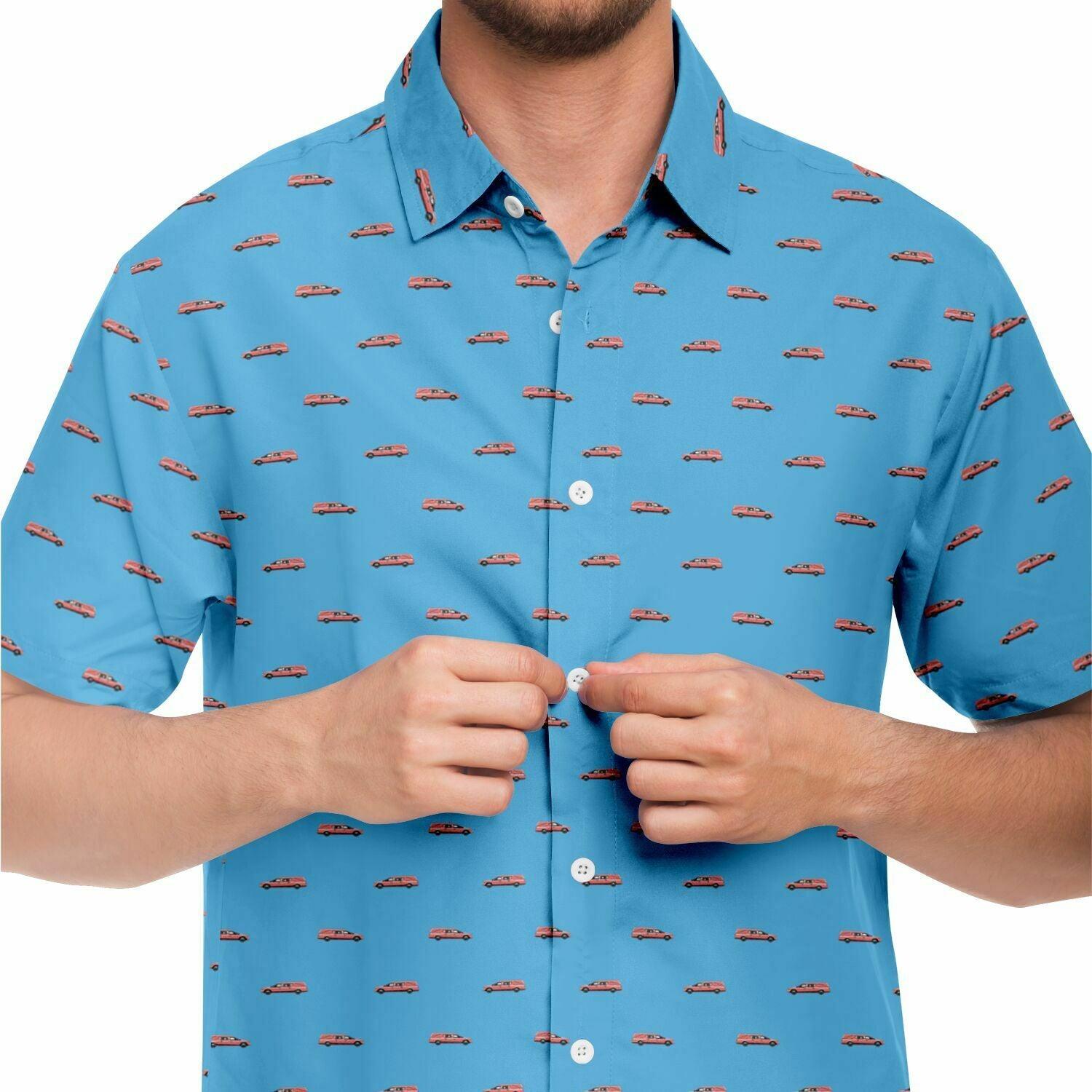 button up short sleeve shirt in baby blue with little pink hearses patterned on it. Close up front view.