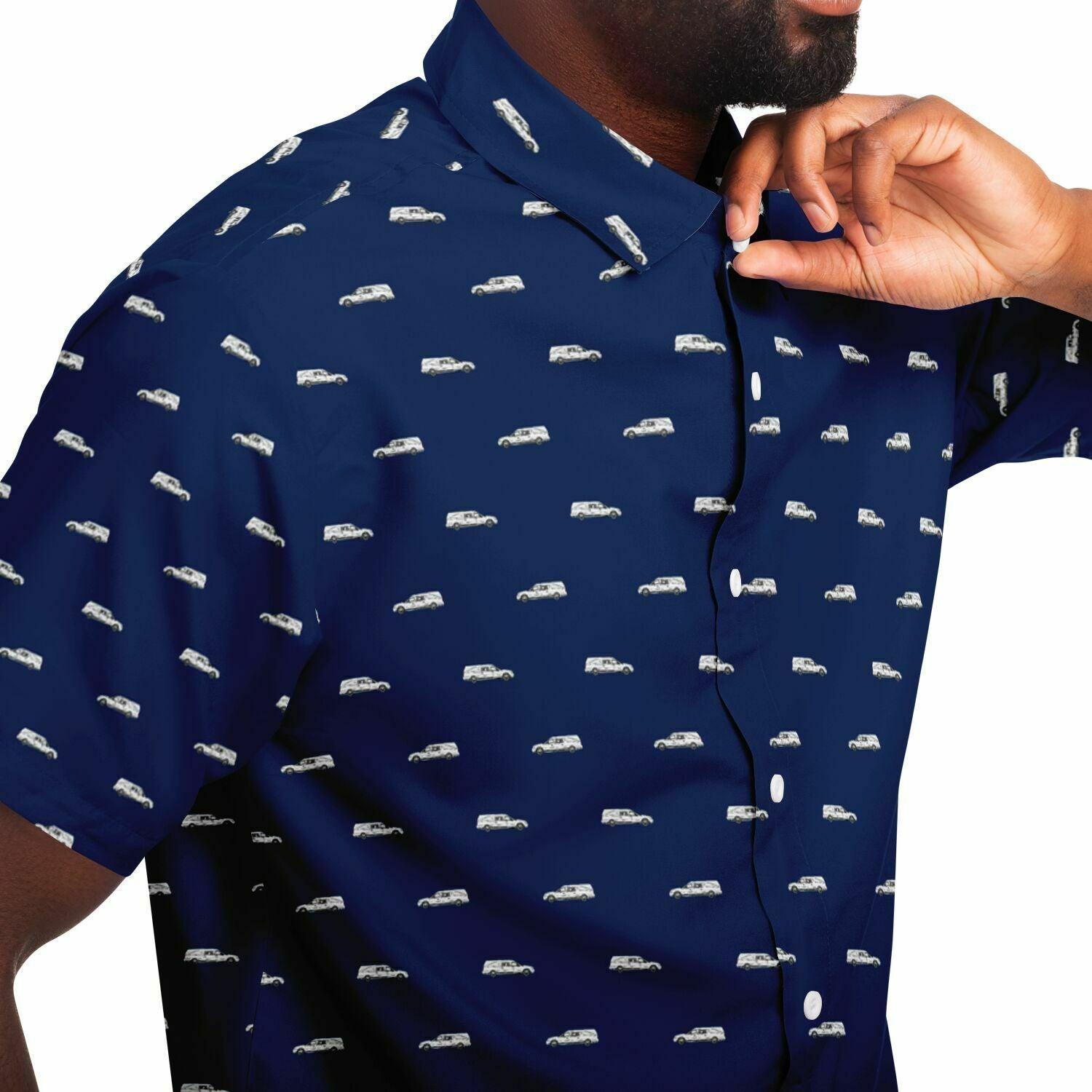 Dark navy blue button up tee shirt with white funeral hearse pattern. Close up side angle view