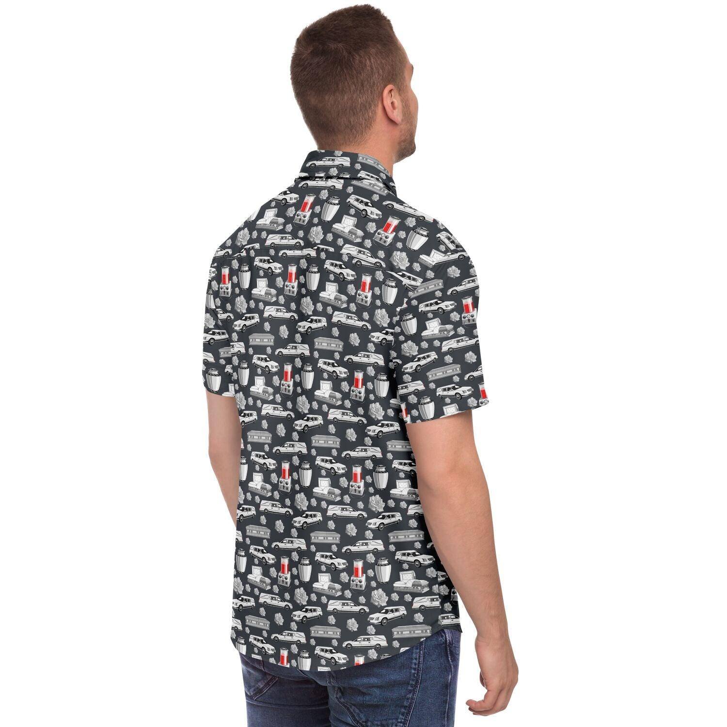 back view man wearing button down tshirt with funeral hearse, cremation urn, casket, coffin, embalmer, pattern on it.